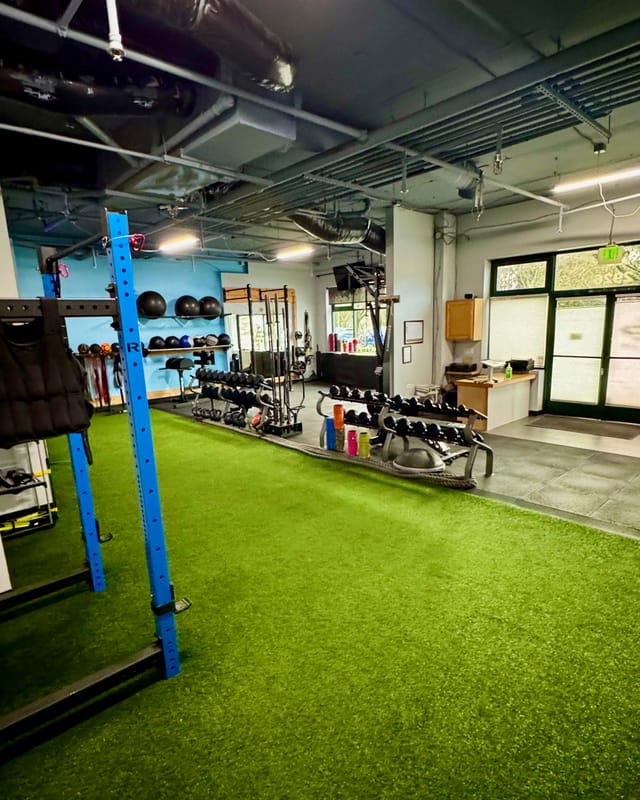 The turf lane looking back toward the racks and the studio office.